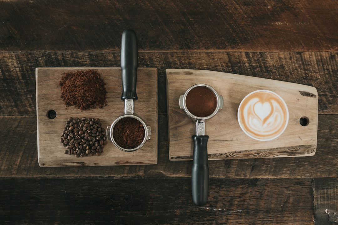 Close-up of a pour-over coffee cup showing dark, bitter-looking liquid next to a lighter, diluted cup, illustrating the concept of bitterness not over-extraction.