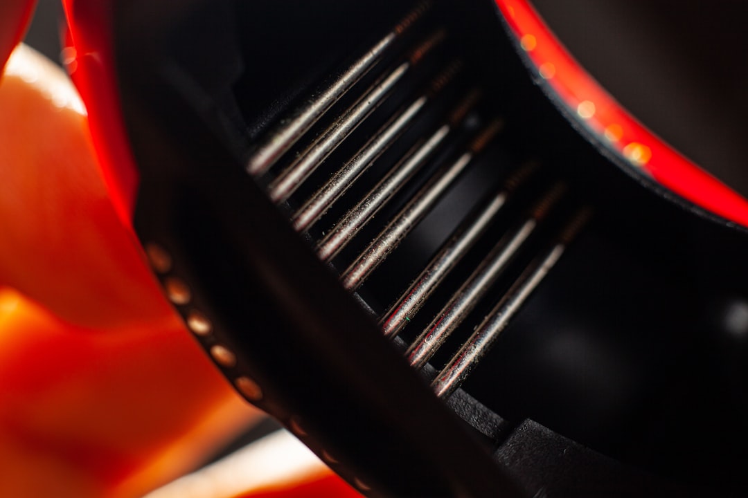 Close-up of conical burrs inside a coffee grinder, showing the crushing geometry that creates fine particles for espresso